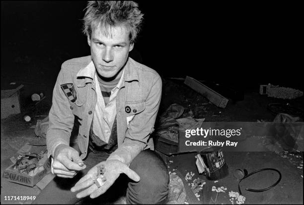 American artist and musician John Gullak of punk band The Mutants shows object found at a landfill in San Francisco, California, US, 30th June 1978.