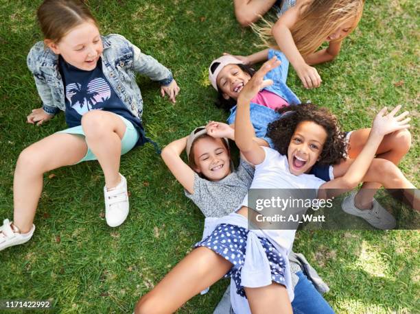 playing together brings us so much joy - child lying down stock pictures, royalty-free photos & images