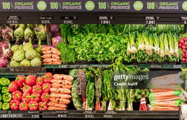 organic produce in grocery store - produce aisle stock pictures, royalty-free photos & images