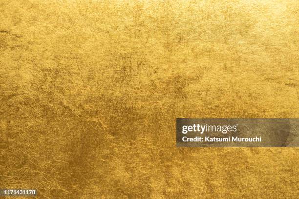 gold foil background - gold leaf stock pictures, royalty-free photos & images