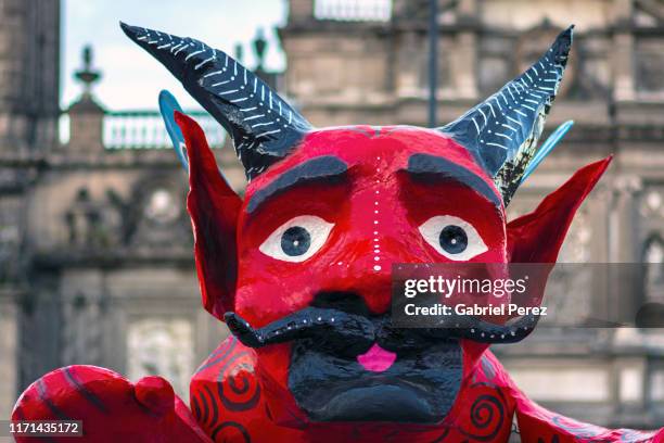 a day of the dead character in mexico city - papier stock pictures, royalty-free photos & images