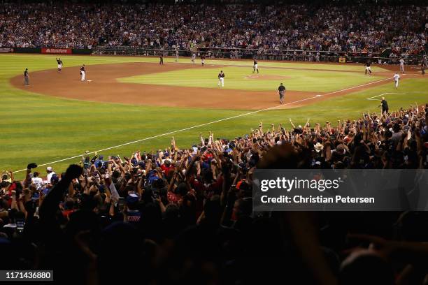 Relief pitcher Archie Bradley of the Arizona Diamondbacks celebrates after defeating the Los Angeles Dodgers 6-5 in the MLB game at Chase Field on...