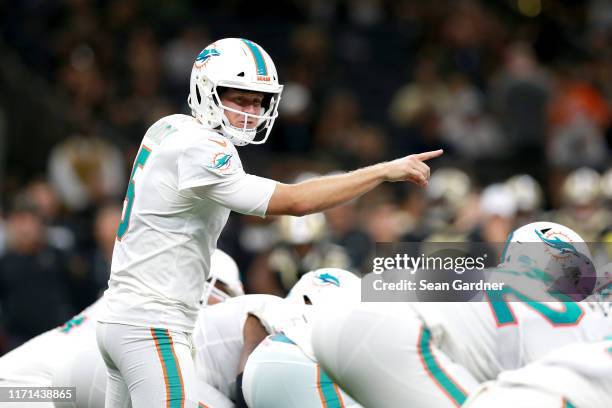 Jake Rudock of the Miami Dolphins in action during a NFL preseason game against the New Orleans Saints at the Mercedes Benz Superdome on August 29,...