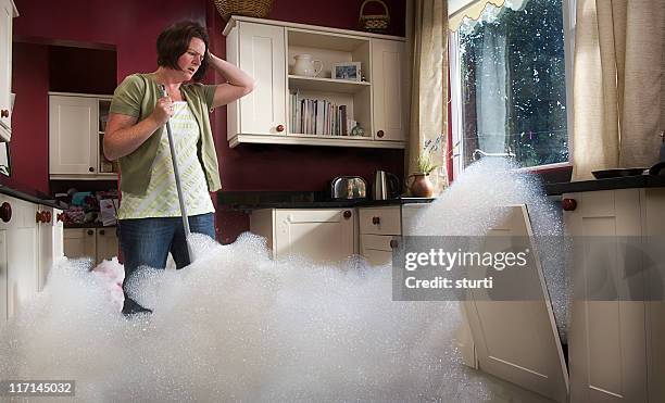 dishwasher malfunction - dishwasher stock pictures, royalty-free photos & images