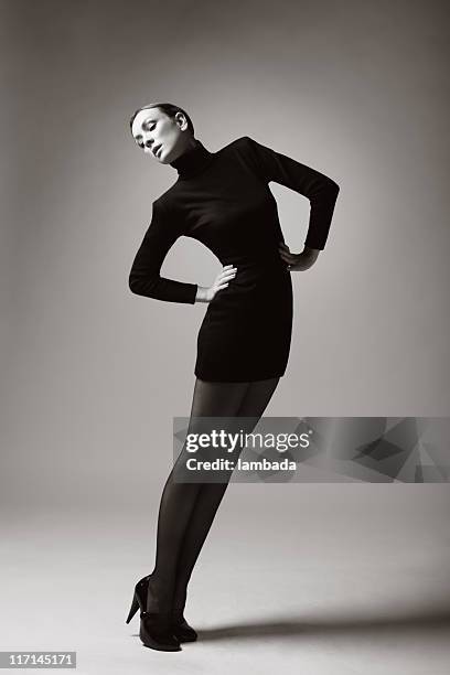 fashion portrait of beautiful woman - black dress with stockings stock pictures, royalty-free photos & images