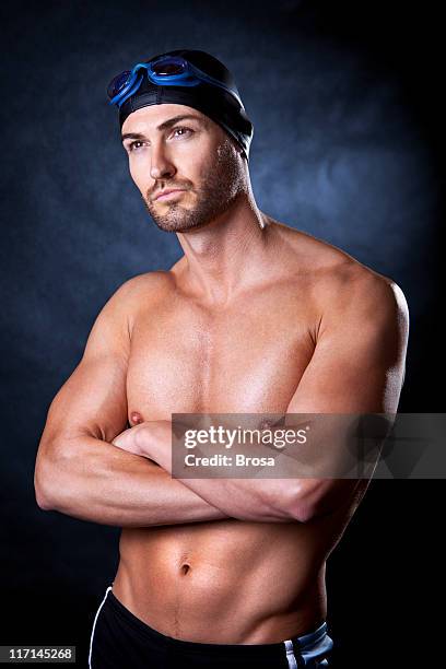 the swimmer - young men in speedos stock pictures, royalty-free photos & images