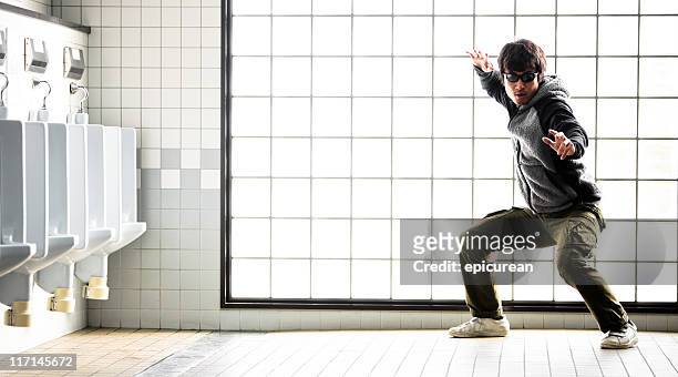 guardian of the urinals - kung fu pose stock pictures, royalty-free photos & images