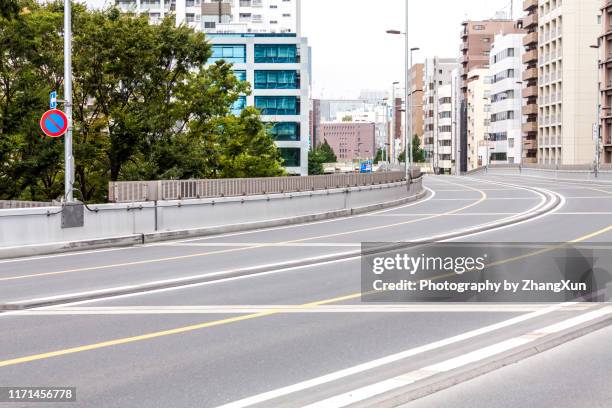 tokyo street road, japan at day time. - tsukishima tokyo stock pictures, royalty-free photos & images