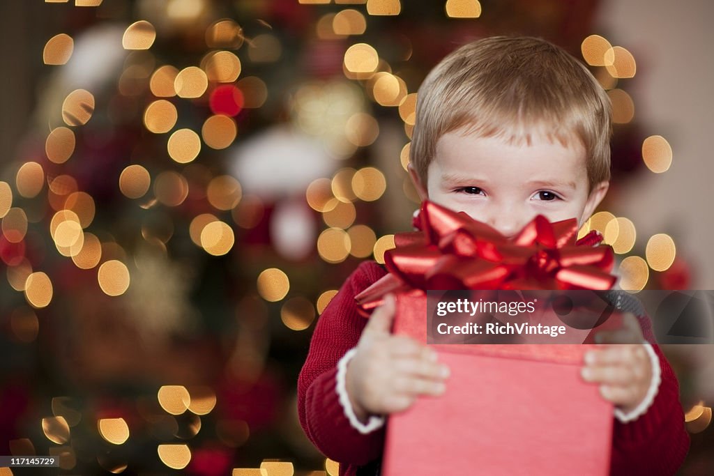 Young Boy Smiles with his Christmas Present