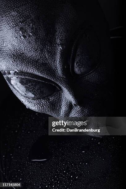 dark alien creature - extraterrestrial stock pictures, royalty-free photos & images