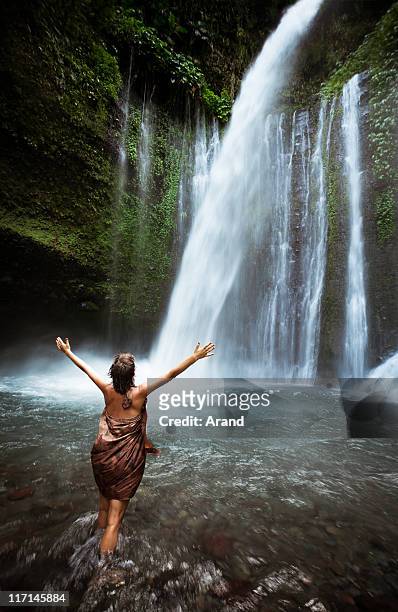 young woman at waterfall - lombok bildbanksfoton och bilder