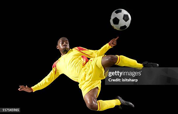 soccer player - black soccer player stock pictures, royalty-free photos & images