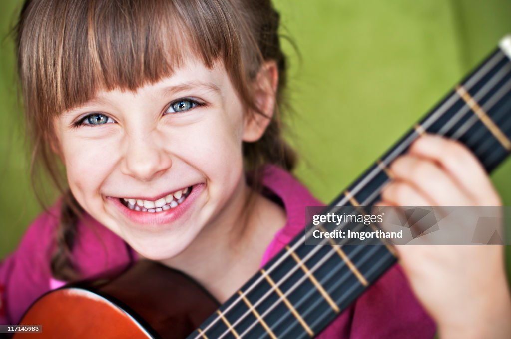 Having fun playing the guitar