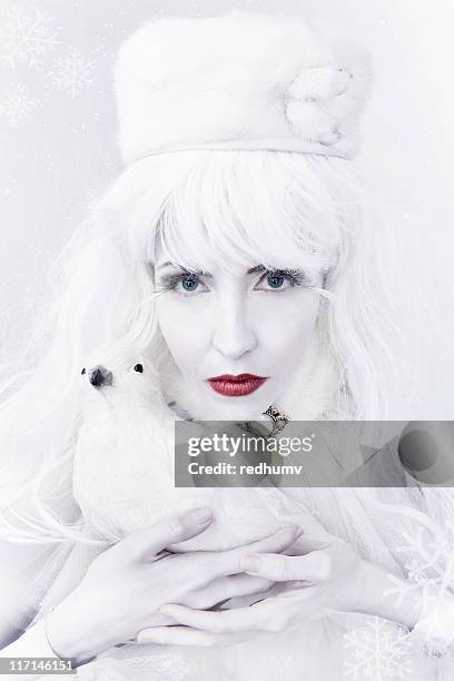 snow queen and white dove - queens head stock pictures, royalty-free photos & images