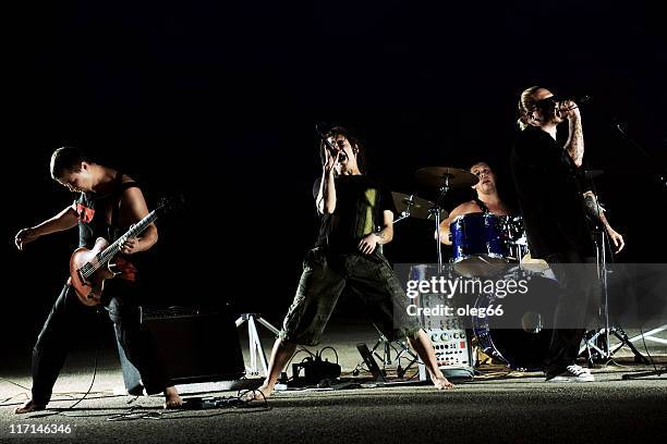 rock band - rock group stock pictures, royalty-free photos & images