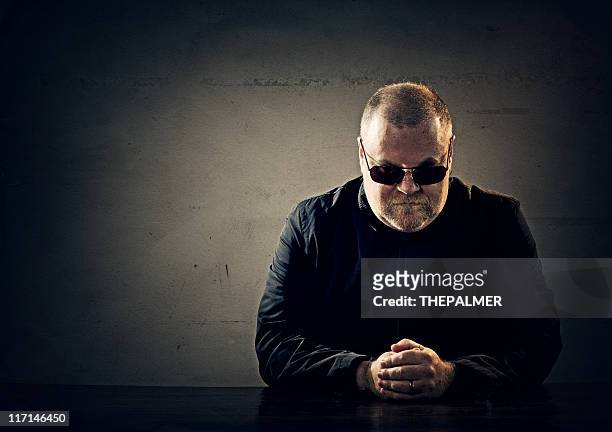mafia member - cruel stock pictures, royalty-free photos & images