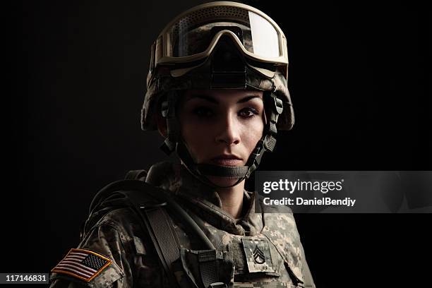 portrait of a female us military soldier - us armed forces stock pictures, royalty-free photos & images