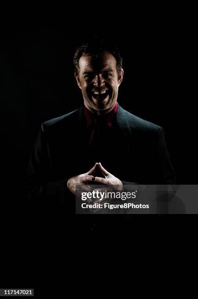 crazy man with laugh - evil stock pictures, royalty-free photos & images