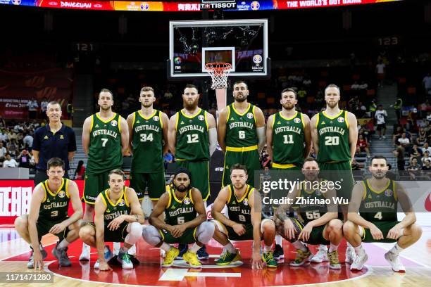 Coach Andrej Lemanis and players of Australia line up for the team photo during the 2019 FIBA World Cup, first round match between Canada and...