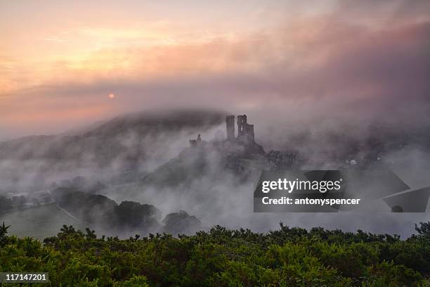 corfe castle autumn mist - corfe castle stock pictures, royalty-free photos & images
