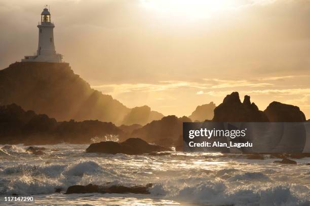 corbiere lighthouse,jersey. - jersey stockfoto's en -beelden