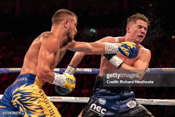 Luke Campbell and Vasily Lomachenko are pictured during the WBA, WBO, WBC Lightweight World Title contest between Vasily Lomachenko and Luke Campbell...