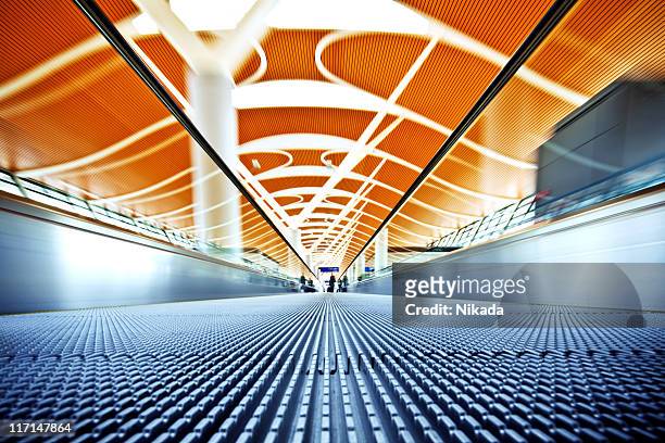 airport walkway - airport lights stock pictures, royalty-free photos & images