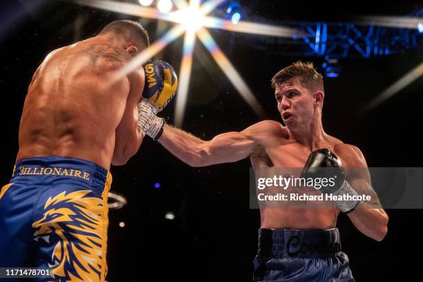 Luke Campbell and Vasily Lomachenko are pictured during the WBA, WBO, WBC Lightweight World Title contest between Vasily Lomachenko and Luke Campbell...