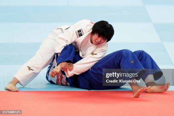 Shori Hamada of Japan and Maria Suelen Altheman of Brazil compete in the Women’s +70kg for the Mixed Team Competition semi final between Japan and...