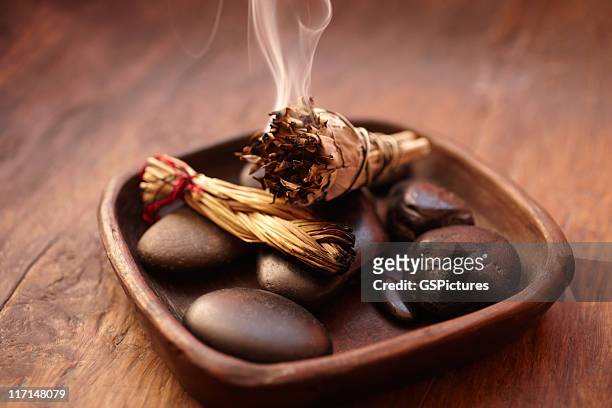 burning incense sage stick and pebbles - ceremony stock pictures, royalty-free photos & images