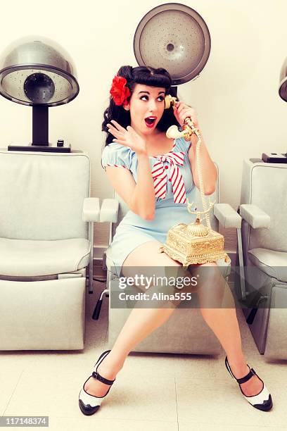 pin-up: sexy woman in a beauty salon on the phone - 40s pin up girls stock pictures, royalty-free photos & images