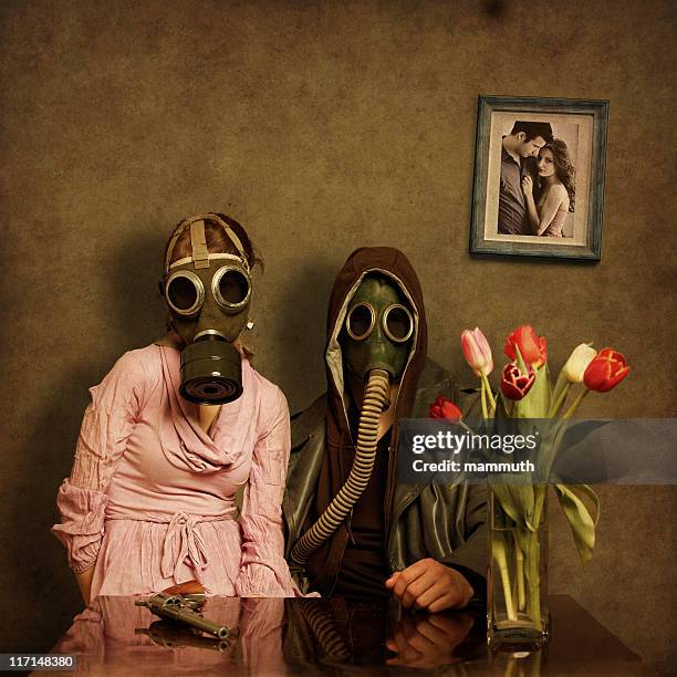 post apocalyptic couple - man holding out flowers stock pictures, royalty-free photos & images