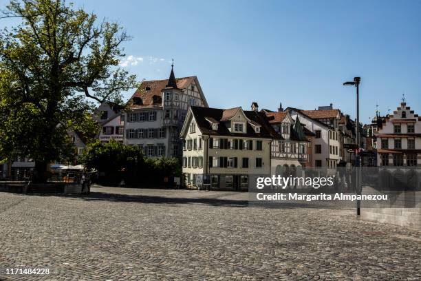 streets of st. gallen city in a sunny summer day - städtischer platz stock-fotos und bilder