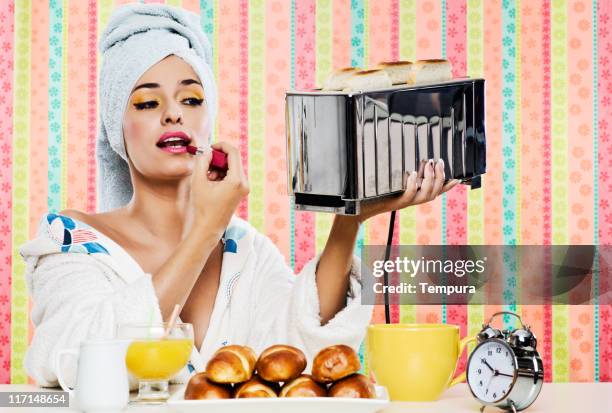 gorgeous woman's, breakfast lipstick and toaster. - diva stockfoto's en -beelden