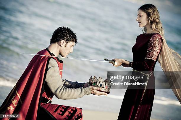 knighting the king - king and queen stock pictures, royalty-free photos & images