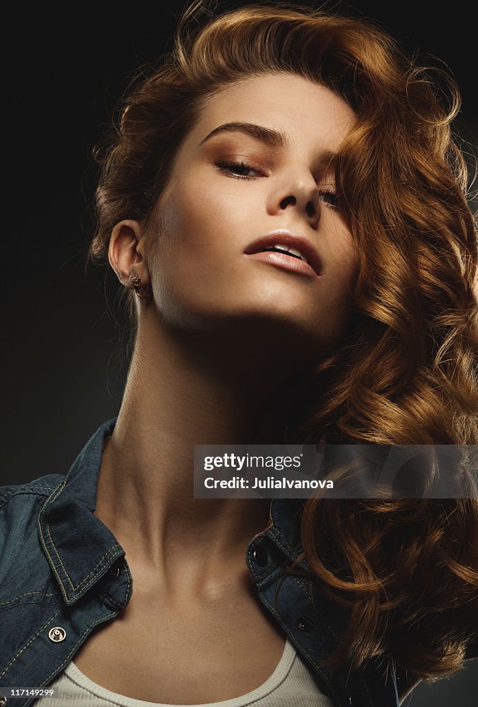 Studio portrait of beautiful young woman