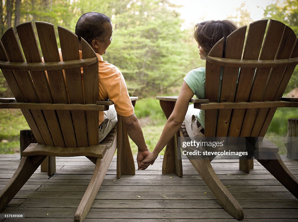 Adirondack Couple Holding Hands