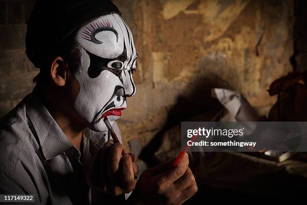 one chinese opera actor in make-up - chinese opera makeup stock pictures, royalty-free photos & images