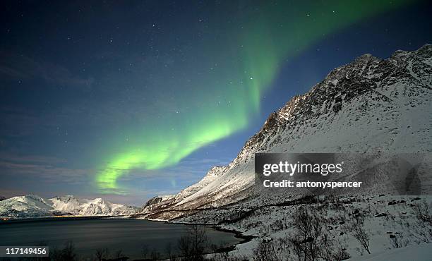 bizarre berge und aurora borealis. - alta stock-fotos und bilder