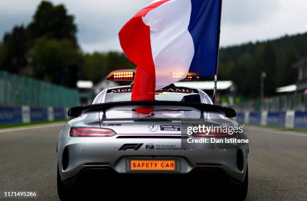 The safety car flies a French flag in tribute to the late Formula 2 driver Anthoine Hubert on the drivers parade before the F1 Grand Prix of Belgium...