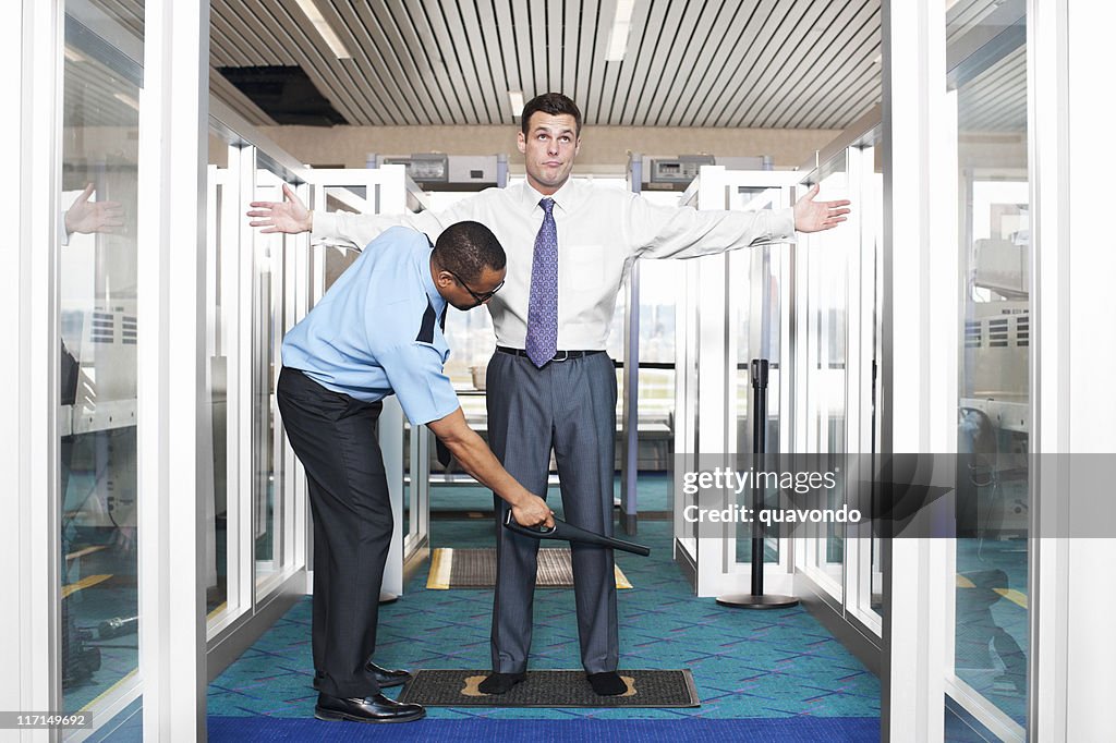 Airport Security Check with Young Businessman