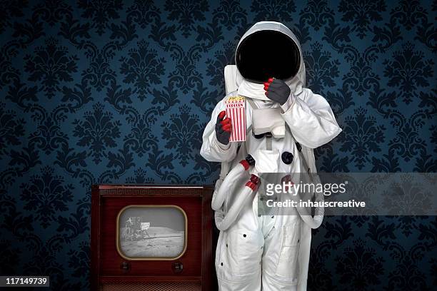 astronaut watching moon landing - cosmonaut stock pictures, royalty-free photos & images