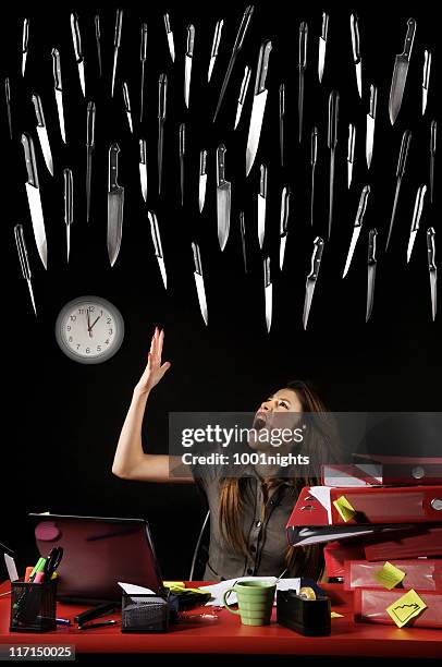 nervous businesswoman - night of the long knives stock pictures, royalty-free photos & images
