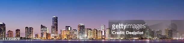 brickell and miami city skyline at night in florida usa - brickell miami stock pictures, royalty-free photos & images