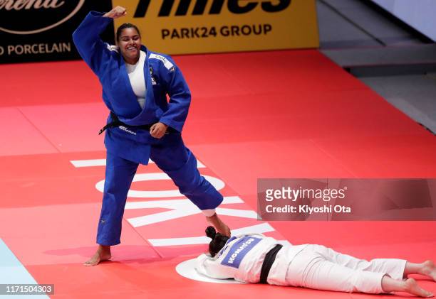 Maria Suelen Altheman of Brazil celebrates winning over Munkhtsetseg Otgon of Mongolia in the Women's +70kg of the Mixed Team Competition bronze...