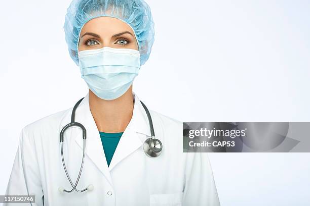 female doctor with mask and stethoscope - face shield stock pictures, royalty-free photos & images