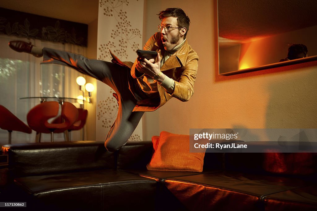 Retro Secret Agent Man Diving Over Couch