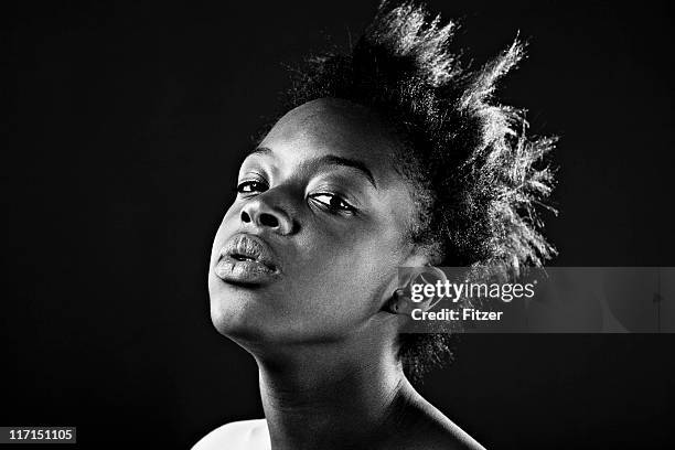 young black woman, indoor, portrait - black and white portrait woman stock pictures, royalty-free photos & images