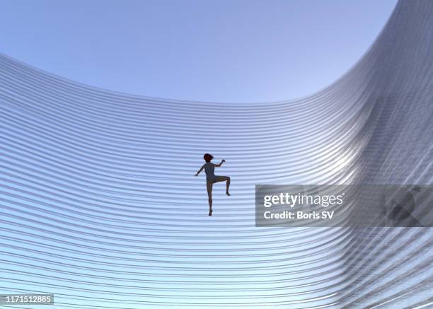 climbing the glass wall - girl power graphic stock pictures, royalty-free photos & images
