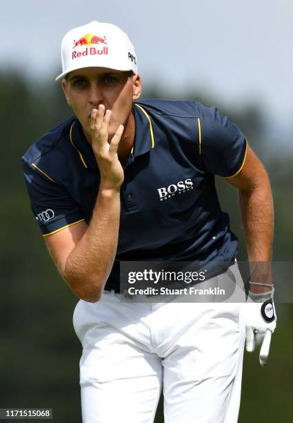 Matthias Schwab of Austria reacts after playing a shot on the fourteenth during Day Four of the Omega European Masters at Crans Montana Golf Club on...